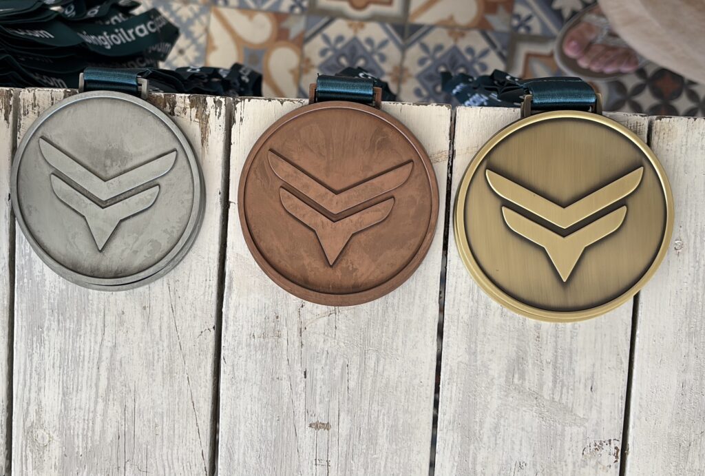 5. Award Practical Items or Use a Perpetual or Upcycled Trophy<br>We have one perpetual trophy at the end of the year and we award medals to each event winners
The ribbons of the medals are made from recycled plastic and the medals themselves are metal (I don