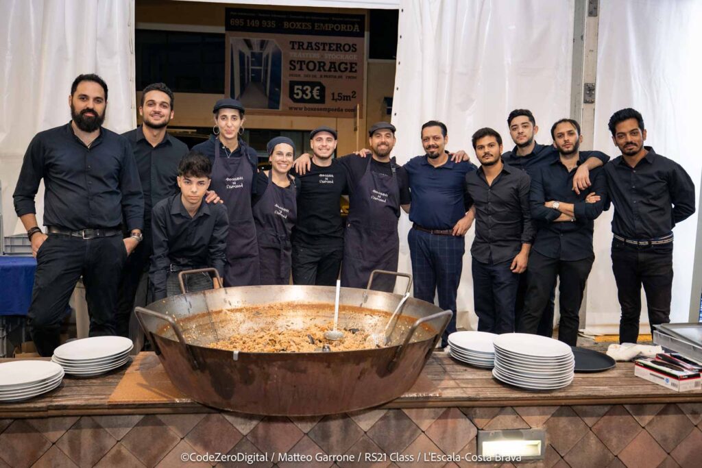 17. Offer Vegetarian or Vegan Alternatives<br>During the RS21 World Championship racing days (from September 23 to 28) we ensured that vegetarian and vegan alternatives were available to all participants.

Daily Meals: From September 23 to 28, meals were served to the sailors after the races. Apart from the special events on the 23rd (inauguration), the 26th (crew dinner), and the 28th (closing ceremony), a pasta dish was provided daily with two options: one vegan and one containing either meat or fish.

Inauguration (September 23): The inauguration event featured a variety of appetizers. Vegan and vegetarian options included olives, cheese, and Spanish omelette.

Crew Dinner (September 26): The crew dinner consisted of a seafood rice dish. The meal began with a comprehensive selection of appetizers, including: potato salad salad bowl, gazpacho (cold tomato soup) shots, guacamole with chips and hummus.