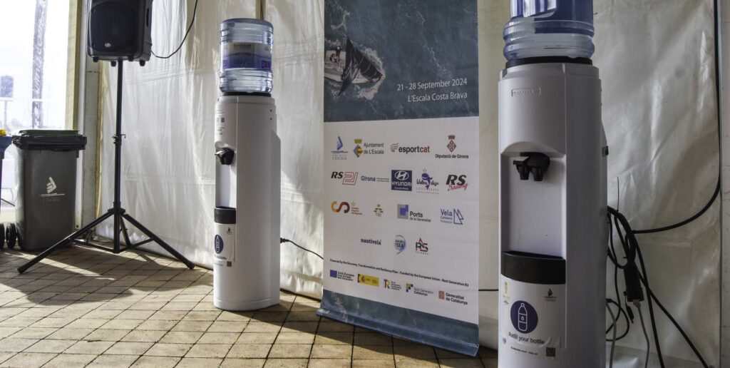 8. Post Educational and Reusable Signage<br>Water and waste points were signaled to help its location and use. Waste bin signals included a QR code linked to all the sustainable measures to be checked by the sailors as well as the signal Sustainable event (included as a picture), which was available at the race office and next to the water point, at the regatta