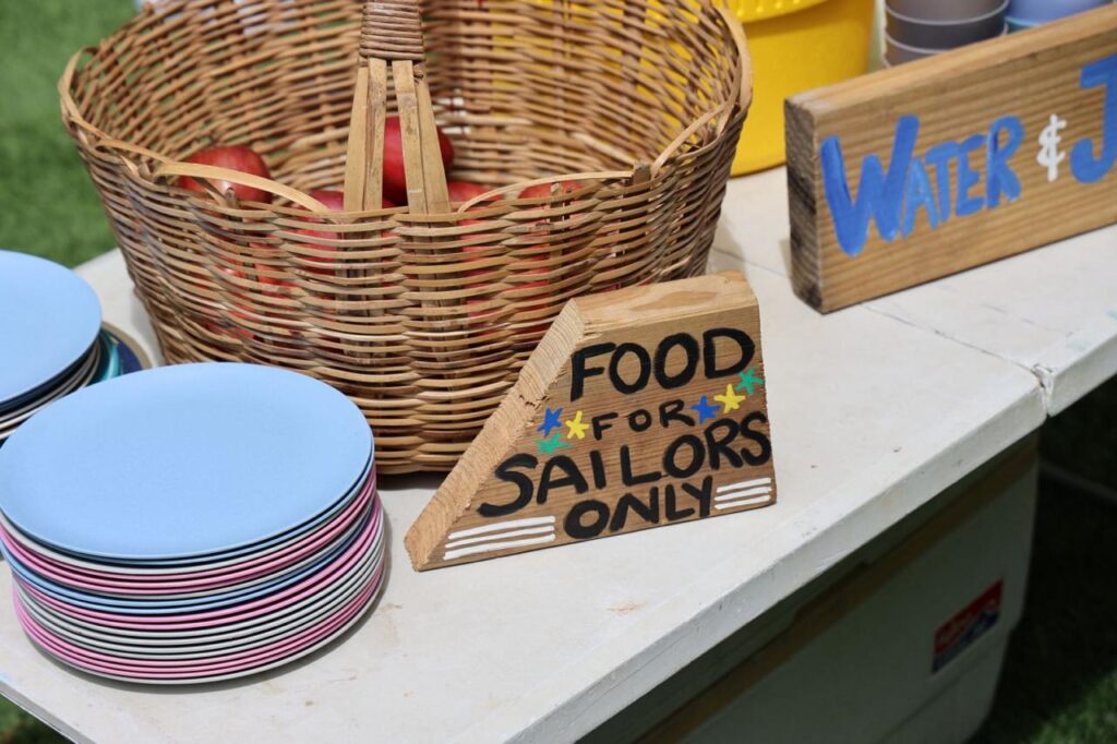 3. Serve Food with Plastic-Free Dinnerware<br>Reusable bamboo plates and cups, as well as a few other reusable hard plastic plates and cups were used and enjoyed by all attending. We had the macaroni pie with our hands, as we didn