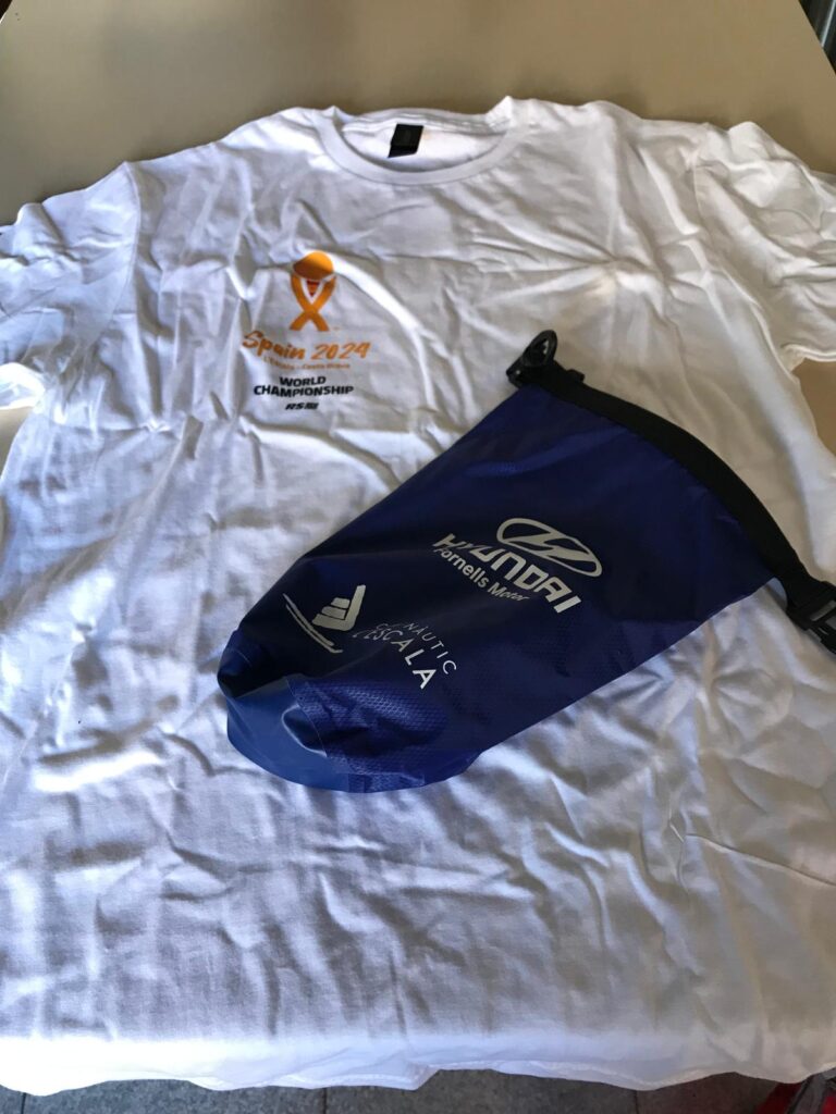 4. Skip Bags or Go Reusable<br>During the 2024 RS21 World Championship, no paper or plastic bags were distributed to participants. Upon registration, they received a reusable waterproof bag courtesy of one of the event