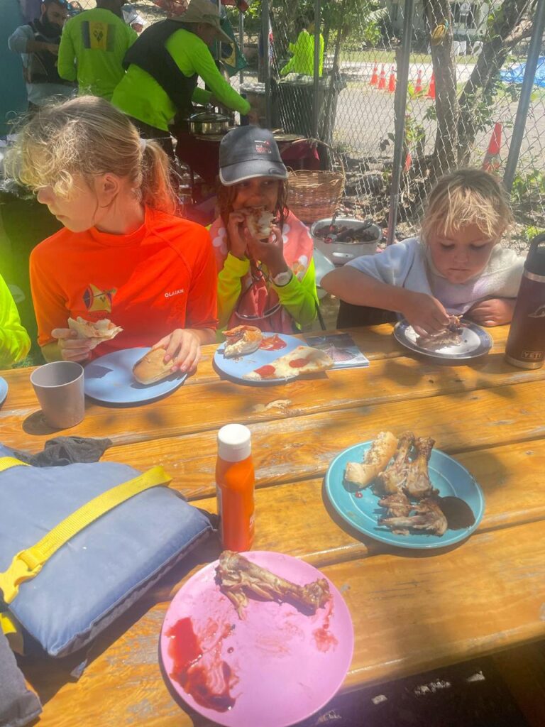 3. Serve Food with Plastic-Free Dinnerware<br>Reusable bamboo plates and cups, as well as a few other reusable hard plastic plates and cups were used and enjoyed by all attending. We had the macaroni pie with our hands, as we didn
