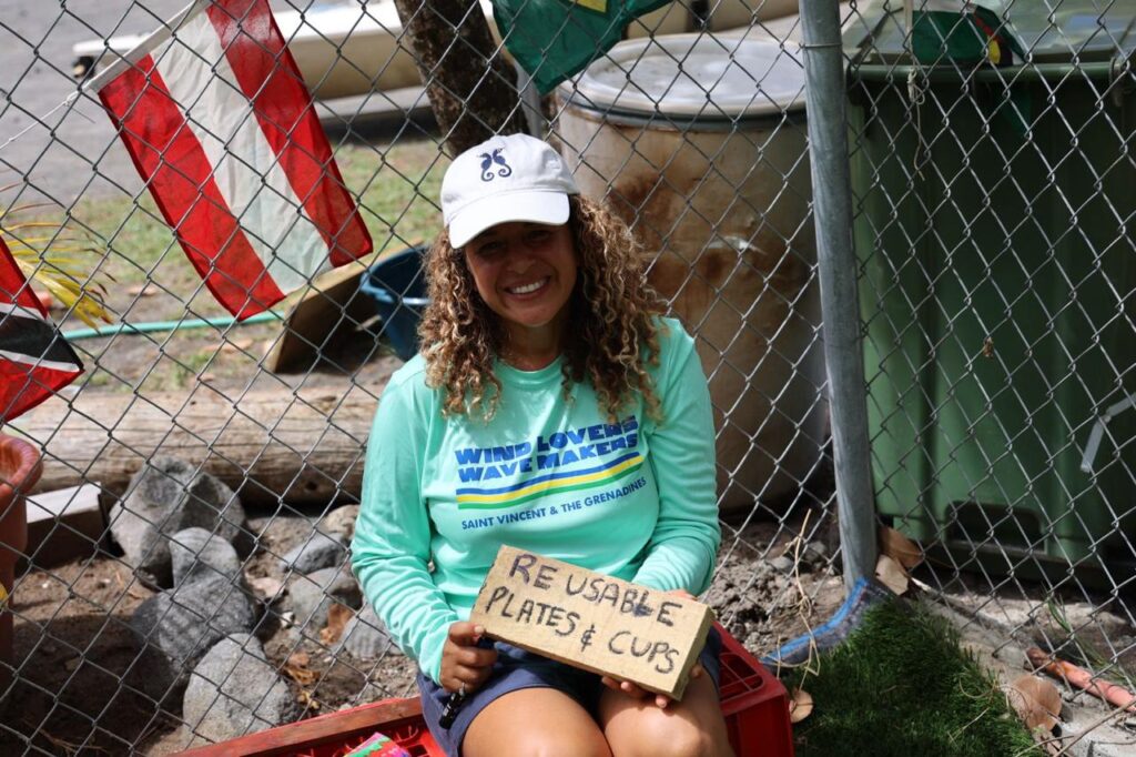 8. Post Educational and Reusable Signage<br>We hand painted all the signs on discarded pieces of wood, as well as directly painting on an old barrel to collect any unavoidable single-use plastic bottles that a random visitor may have brought to the event