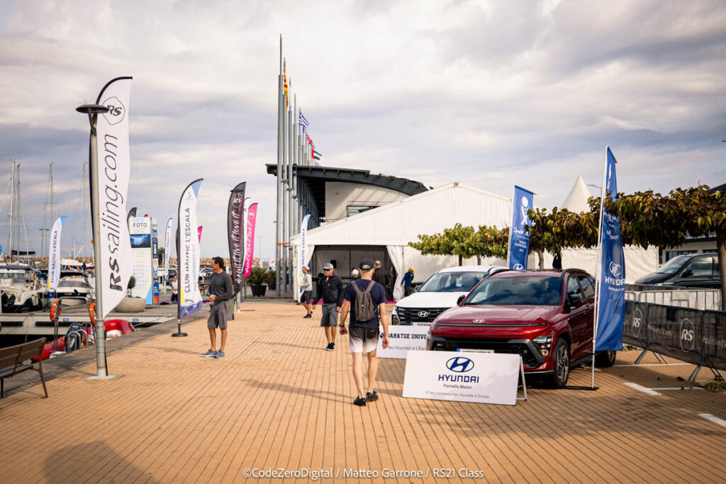 18. Promote Alternative Transportation<br>During the RS21 World Championship, we actively promoted the use of alternative transportation methods to reduce the environmental impact of the event.

Hybrid Vehicles: Our sponsor, Hyundai - Fornells Motor, provided four hybrid vehicle models for the transportation of regatta personnel throughout the event. These vehicles were used daily and were also on display for the duration of the regatta.

Bicycle Rental Service: In addition to the hybrid vehicles, sailors had access to the Club