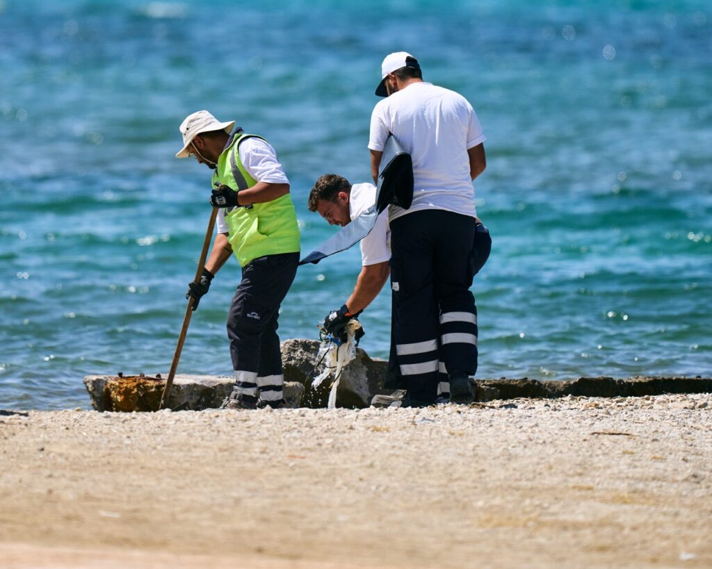 10. Organize a Green Team<br>There was a Green Team, tirelessly working to keep the beach clean.  The plastic trash is still a huge problem in the bay and there is no quick fix.