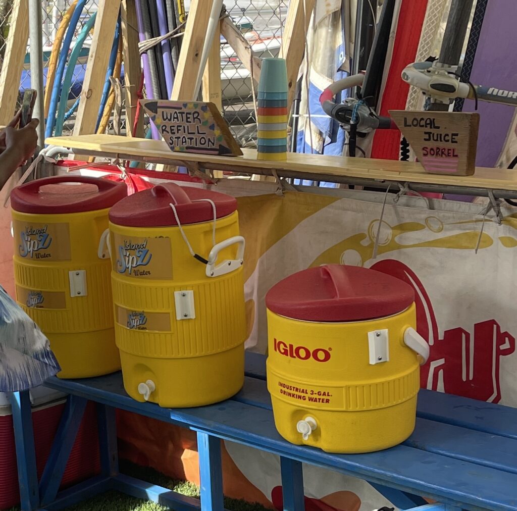 1. Eliminate Single-Use Water Bottles and Provide Water Refill Stations<br>All sailors were advised in pre-event communications to travel with reusable water bottles.

SVG Sailing Week purchased branded reusable cups for distribution to all sailors and volunteers.

Water refill stations were installed at Official race headquarters 

Regrettably, sponsors donated beverages in plastic bottles.
Where there was plastics, recycling was encouraged. There were multiple clearly marked recycling receptacles placed at the venue. All plastics were collected at the end of the event for recycling.

A short post-event sustainability survey assessed awareness and behavior change related to reusable water bottles and plastic reduction.

No single-use plastic straws were purchased, distributed or provided by SVG Sailing Week Organising committee however vendors often sold drinks using plastic straws.

Sailor giveaway bags were made from durable, reusable fabric and branded for long-term use.
Contents prioritized practical items over disposable promotional materials.

Awards were locally produced, wooden crafted boats, as well as a painting painted by a local painter. All trophies were repurposed. 

Sustainability efforts were launched in an online “Green Campaign” 
Website: https://svgsailingweek.com/sailgreensvg

Sustainability messaging were delivered across multiple platforms, ensuring strong visibility and continuous engagement throughout the event. (website, social media including Facebook, instagram, radio). 

Ceremonies (opening, closing, media briefings), The Minister of Tourism  reinforced the event’s environmental commitment and alignment with national sustainability priorities.

Local organisations involved in the green campaign were Sustainable Development Unit - messaging and technical guidance.
Sustainability Commission, SVG Olympic Committee - funding, coordination
National Parks, Rivers and Beaches Authority - logistics and coastal management.
SVG Tourism Authority - promotion and alignment 
Tropical Realism - commissioned artwork
Sargeant Model Boat Shop - crafting of model boats to be used as prizes
Action Bequia - Bequia
SVG Forestry Department 
All Islands Recycling
SVG Tourism Authourity

Reusable branded signage were used across venues.
Heavy emphasis on digital education, including QR codes linking to sustainability actions, beach cleanups, and surveys.

Vendors sourced local produce and seafood at all meals.

Green team was Alexandra Punnett: Vincy Sailing Clean Regatta Manager
Amber Glasgow: Sustainability Commission, Olympic Committee
Brenton Quammie: National Ozone Assistant, Sustainable Development Unit
Kurt Dougan: Environment Resource Analyst, Sustainable Development Unit
Samantha DaSilva: Environment Resource Analyst, Sustainable Development Unit
Tyshana Thomas: Environment Resource Analyst, Sustainable Development Unit
Suzette Jackson: Sustainability Commission, Olympic Committee
Orr Miller: Sustainability Commission, Olympic Committee
Twanique: National Parks, Rivers and Beaches Authority 
Aina Browne: SVG Tourism Authority

Clearly labeled waste stations (recyclables).
Hotels managed food waste collection in dining areas.
Food waste was repurposed for composting or animal feed where possible.

Event communications, schedules, surveys, and education materials delivered digitally.
Use of WhatsApp groups, QR codes, online forms, and an SVG Sailing Week e-magazine.

We hosted a beach clean up, Big Sands, Sandy Bay. Timed to align with the leatherback turtle nesting season. Educational messaging on turtle natal homing and coastal protection. Everyone carpooled. We hired 3 buses, had over 40 volunteers from 15 different organisations. 

For future action we announced that we will grow our green campaign for next year. 

Several videos were posted on our Instagram page https://www.instagram.com/svgsailingweek/
