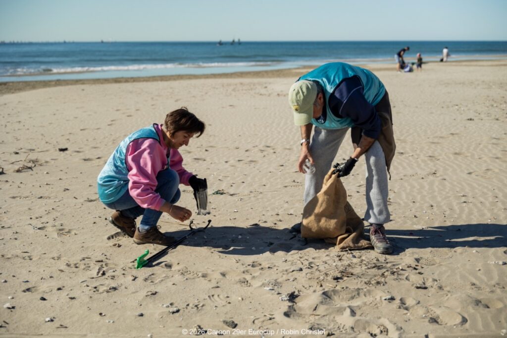 14. Host a Beach or Marina Cleanup<br>14 - We organized a beach clean-up with Ocean Protection France, involving volunteers and members of the public outside the regatta.
We also organized a dedicated clean-up action with the young sailors during a no-wind break. This was a great success and created a strong collective moment.
Initially, we had planned to let sailors join the Green Brigade at any time during the weekend, take part in a beach clean-up, and enter a photo contest. However, this format proved difficult to combine with the rhythm and timing of the races.
We are now looking for new and innovative ideas for next year to further involve young sailors in environmental action during the event.
