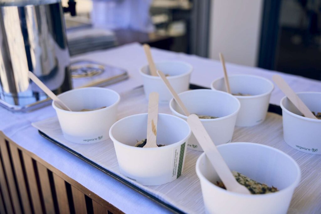 3. Serve Food with Plastic-Free Dinnerware<br>During the after-race refreshments, food and drinks were served using lower-impact disposable tableware, including biodegradable cellulose pulp plates, paper cups and wooden cutlery, avoiding conventional single-use plastic items.
For the social events, reusable tableware was used, including ceramic plates, glassware and metal cutlery, further reducing the use of disposable materials.