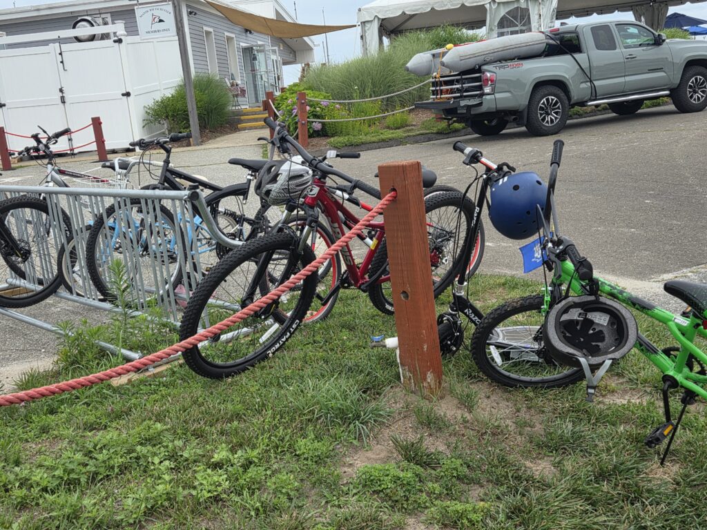 18. Promote Alternative Transportation<br>Bike racks have been upgraded and enlarged to accommodate more bicycles at NBYC. We encourage our racers and their family to arrive at the club by "greener" means if possible!