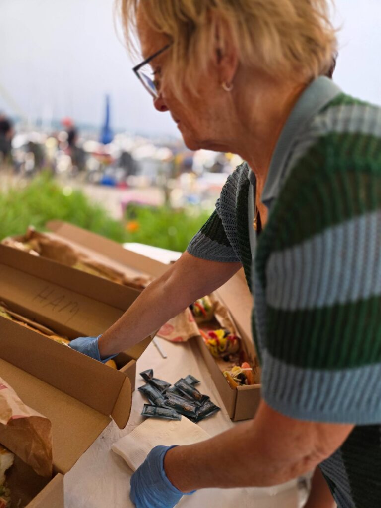3. Serve Food with Plastic-Free Dinnerware<br>Thirty-inch grinders and cans of beverages were served at the reception.