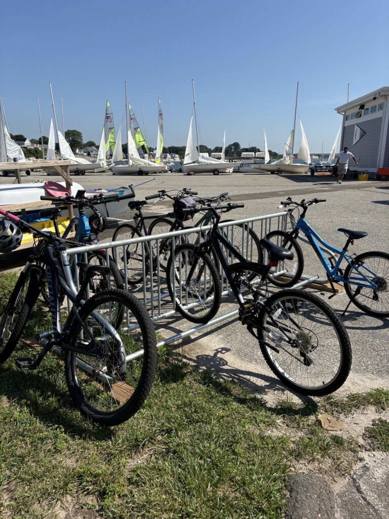 18. Promote Alternative Transportation<br>The NBYC bike rack has been upgraded to allow space for even more bicycles, and it was used by many sailors who attended the regatta. Because the fundraiser regatta is largely NBYC members, it is one that gets more on-foot or on-bike traffic than most.